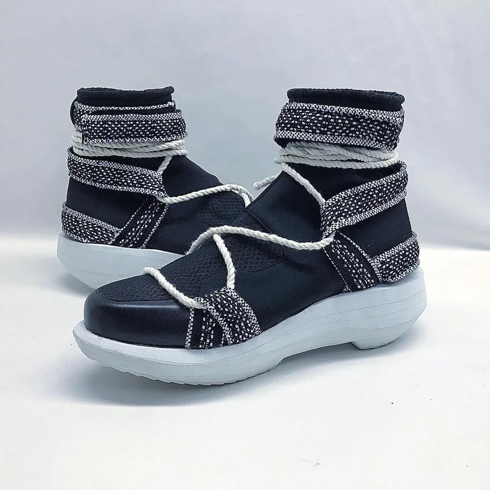 BIGWASI prototype with woven textile straps and rope lacing on a white sole