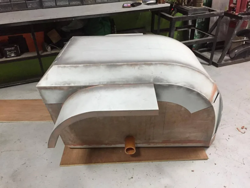 Formed body shell over the frame in the workshop