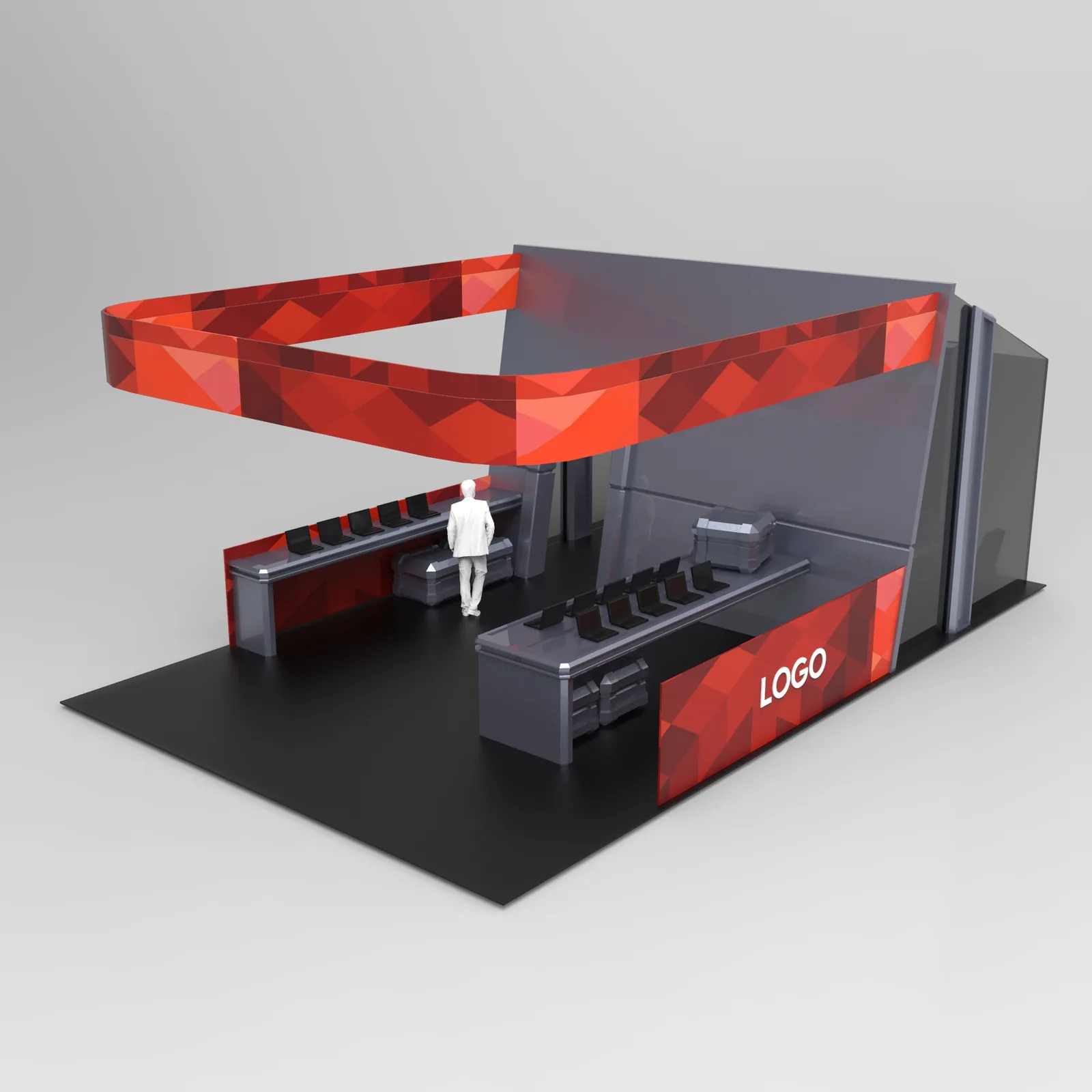 Tech stand with a suspended red canopy ring, demo counters with laptops and a logo panel