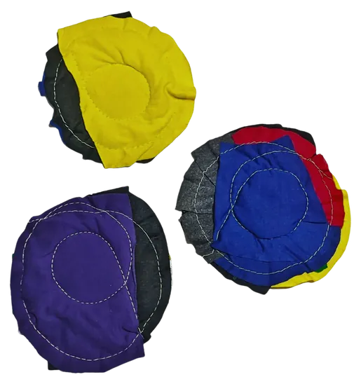 Round patchwork cloth rags in yellow, blue and purple